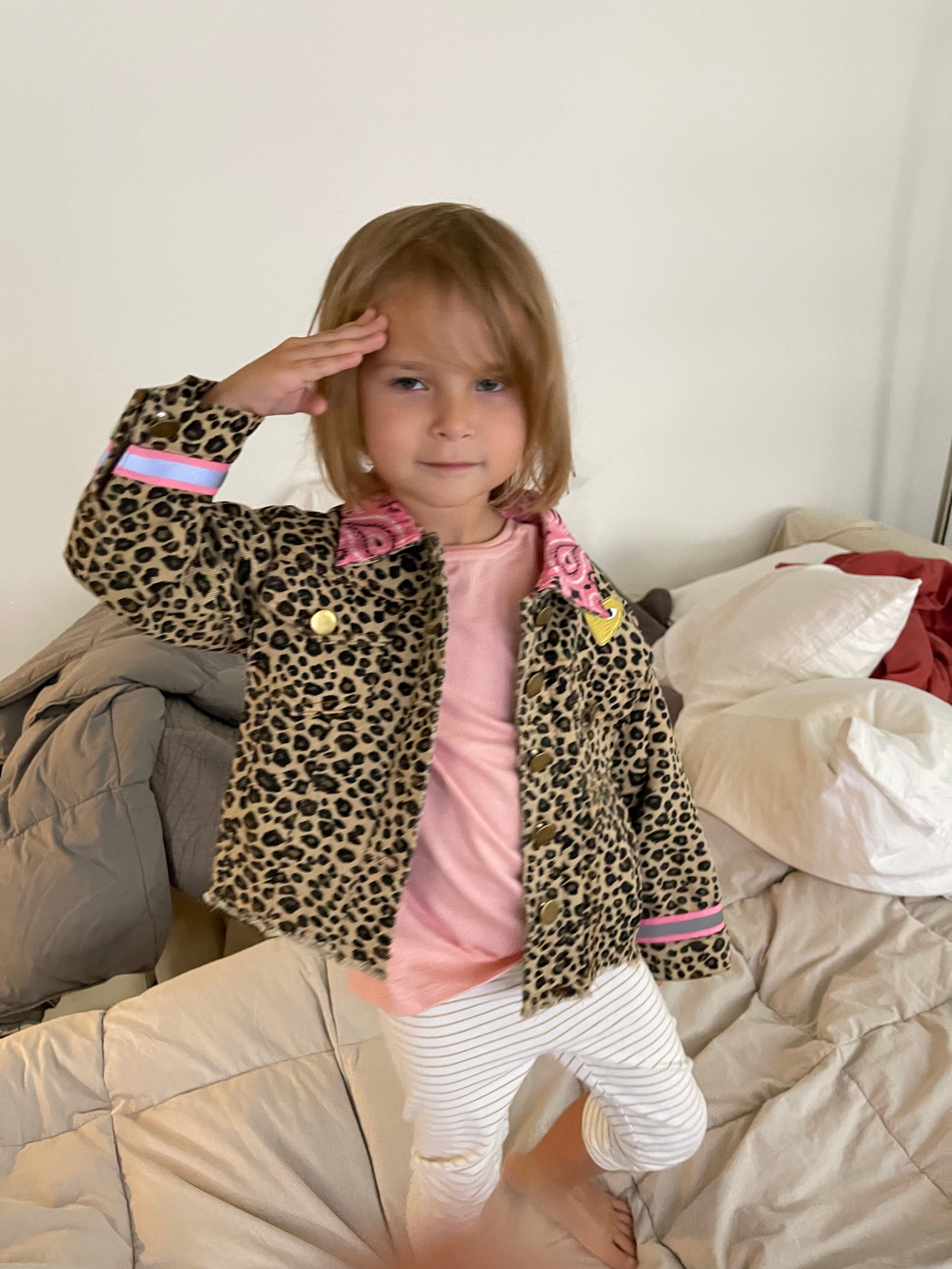 Roar! Leopard Jean Jacket with Brass Snap Closures and a Large Sequin, Multi-Color Star Patch on Back