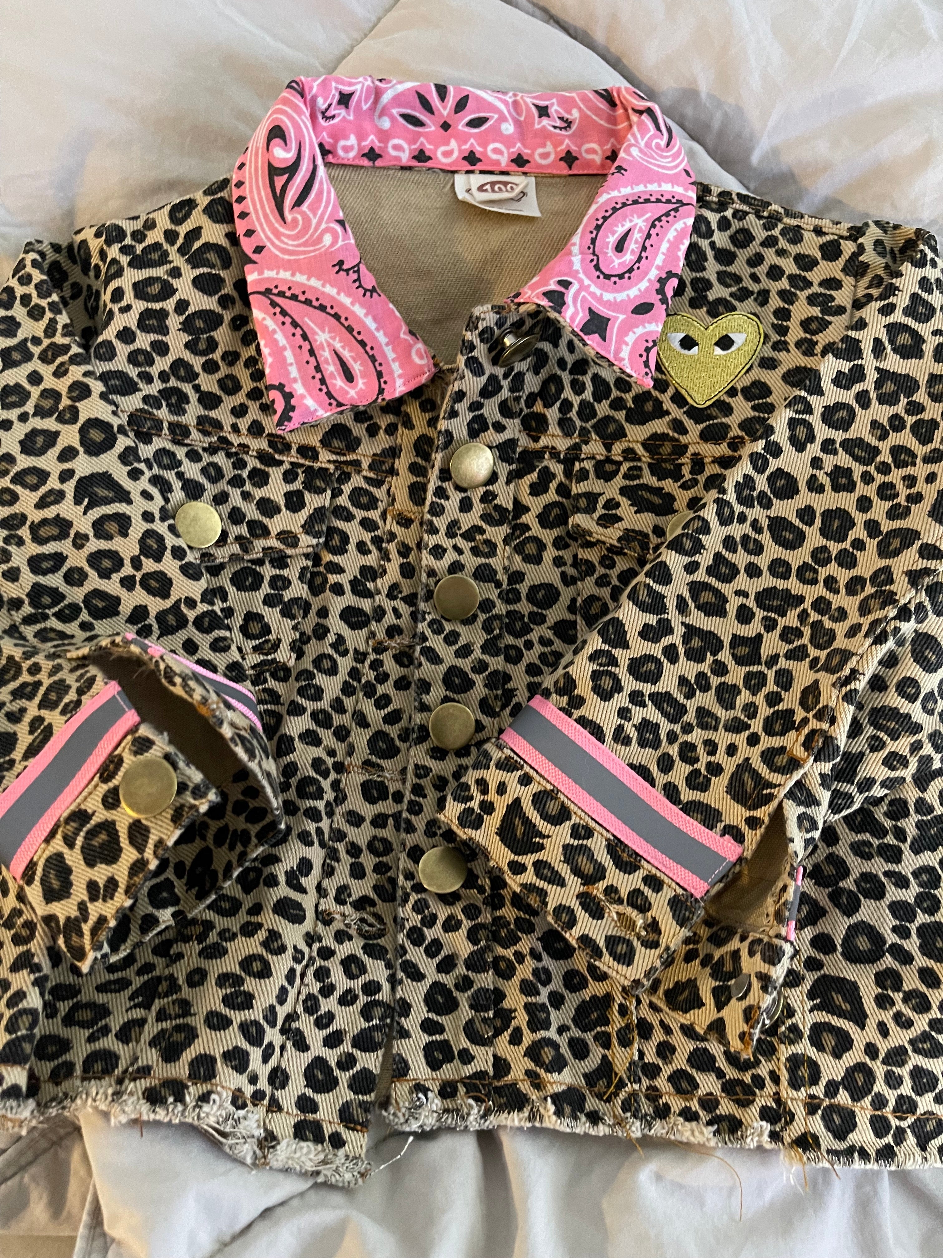 Roar! Leopard Jean Jacket with Brass Snap Closures and a Large Sequin, Multi-Color Star Patch on Back