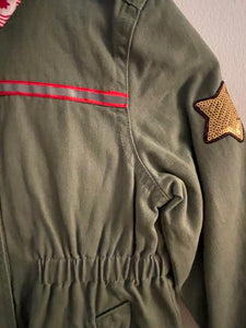 "It's Only Rock and Roll But I Like It", Military-Inspired with Sequin Stars and Other Patches Jacket.