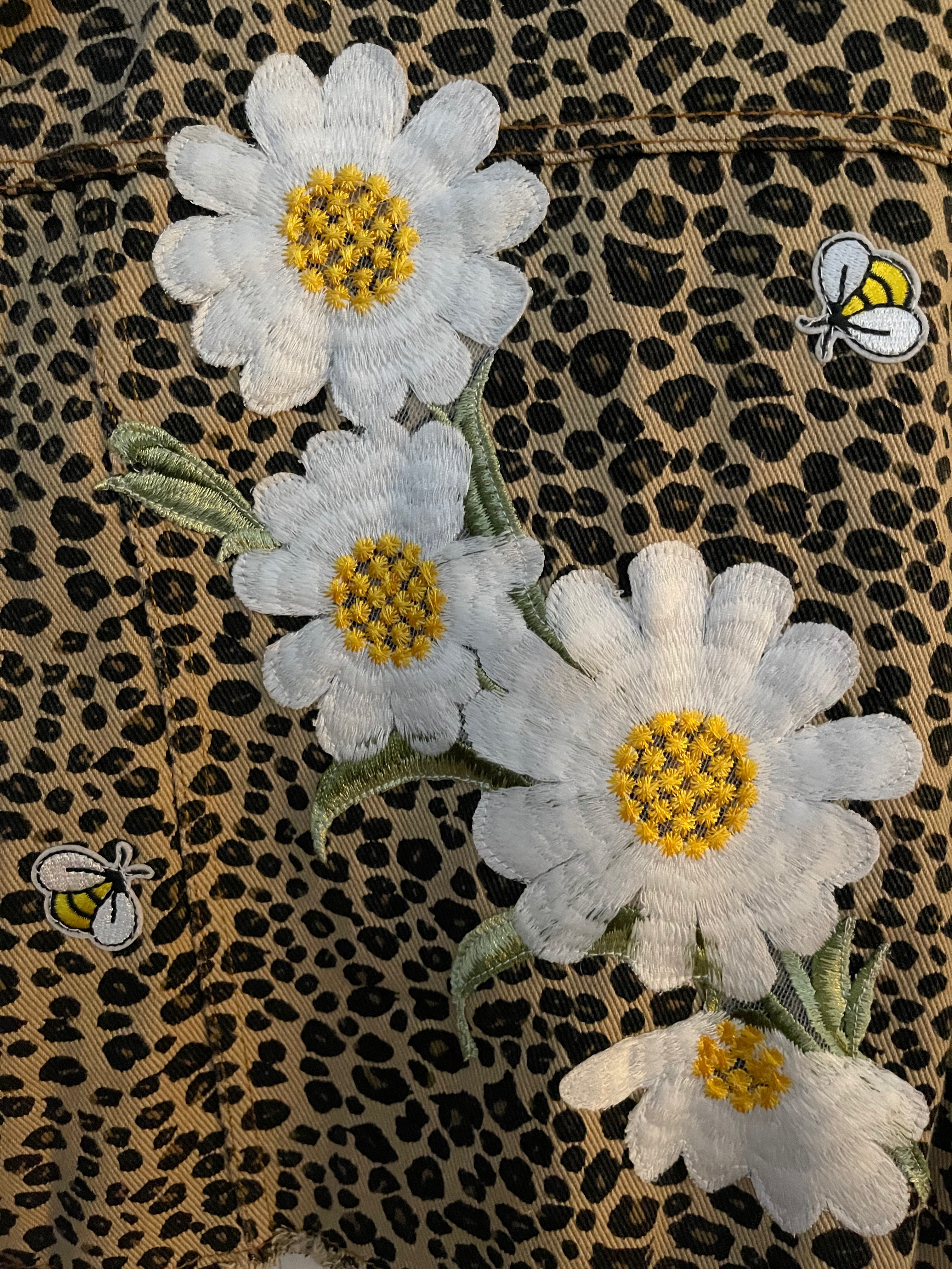 Leopard Print Jean Jacket with a Large Embroidered Daisies Patch on The Back