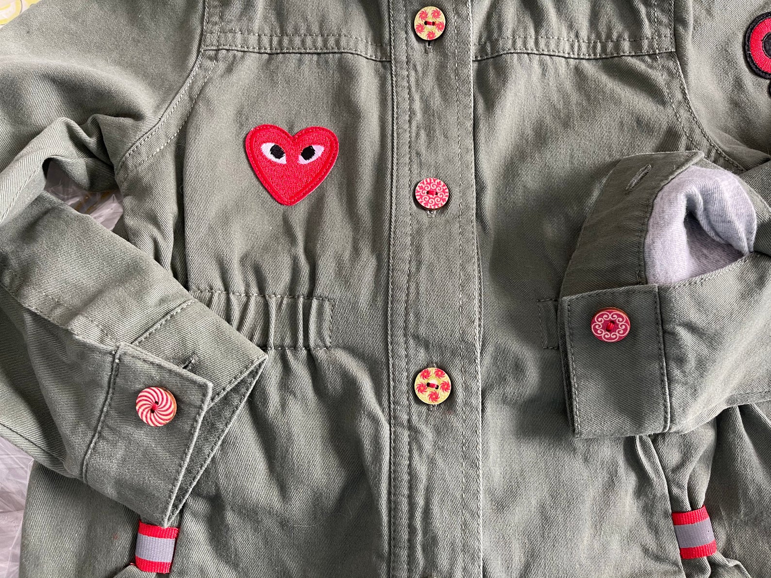 Military-Inspired Cotton Jacket with "OMG!" Patch and Hand-Painted Wood Buttons