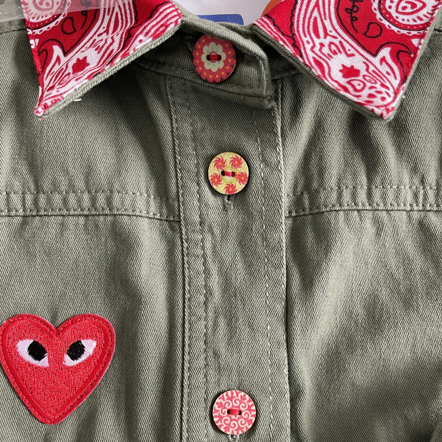 Military-Inspired Cotton Jacket with "OMG!" Patch and Hand-Painted Wood Buttons